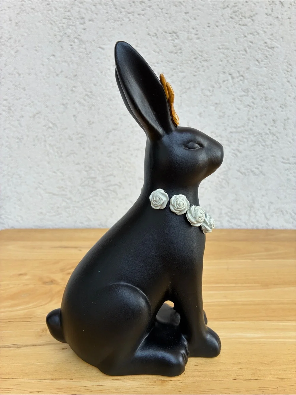 Black ceramic jackalope!  With gold horns snd grey rose necklace!  Bunmy figure